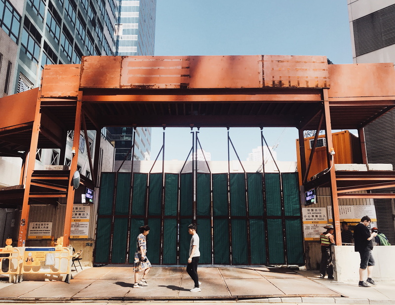 nature, people, sunlight, town, shipping container, clothing, day, building, walking, human, patio, women, porch, real people, group of people, men, building exterior