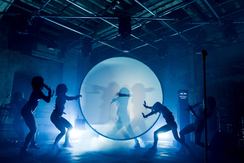 people, shape, togetherness, motion, silhouette, architecture, light, performance, standing, dancers, arts culture and entertainment, adult, group, spotlight