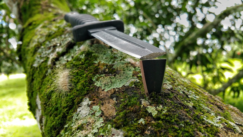 close-up, plant, moss, tree, no people, broken knife, wood - material, stab, solid, focus on foreground, tree stump, knife, black, blade, grass, growth