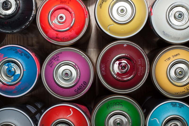 multi colored, paint can, aerosol can, industry, spray paint, cans, group of objects, side by side, variety, no people, choice, high angle view, assorted