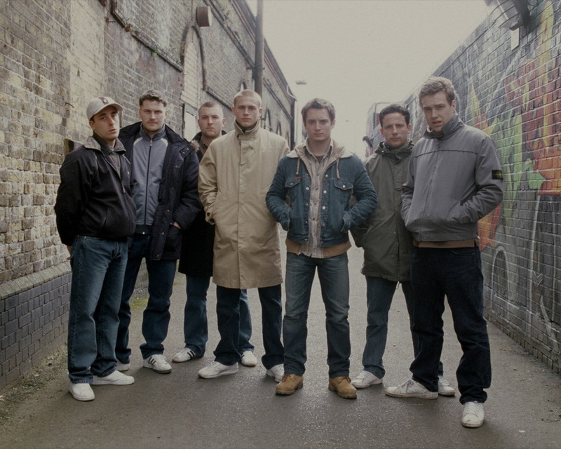 day, friendship, standing, males, hands in pockets, green street hooligans, group, warm clothing, men, group of people, mature men, casual clothing, looking at camera