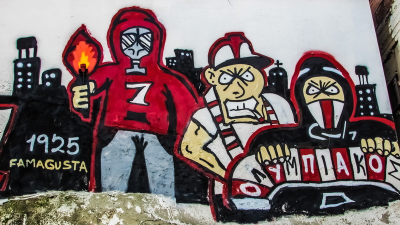 wall - building feature, human representation, art and craft, representation, close-up, Fans, red, human skeleton, communication, creativity, day, western script