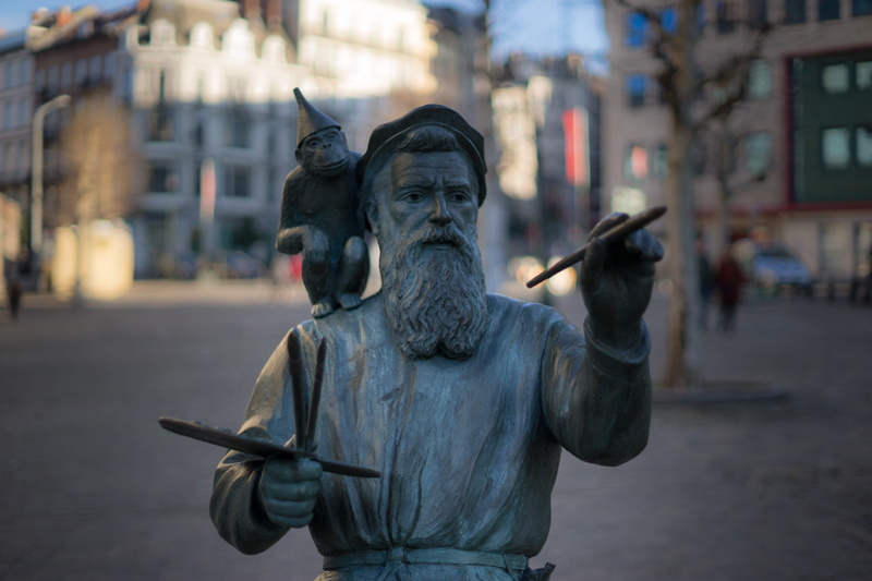 artist, artwork, day, craft, sculpture, close-up, human representation, city life, metal, representation, 5K, belgium, building exterior, outdoors, pieter bruegel the elder