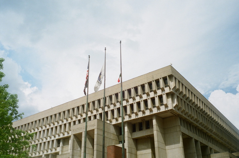 low angle view, the past, building exterior, no people, cloud - sky, flag, outdoors, travel, architecture, united states, history, built structure, brutalist