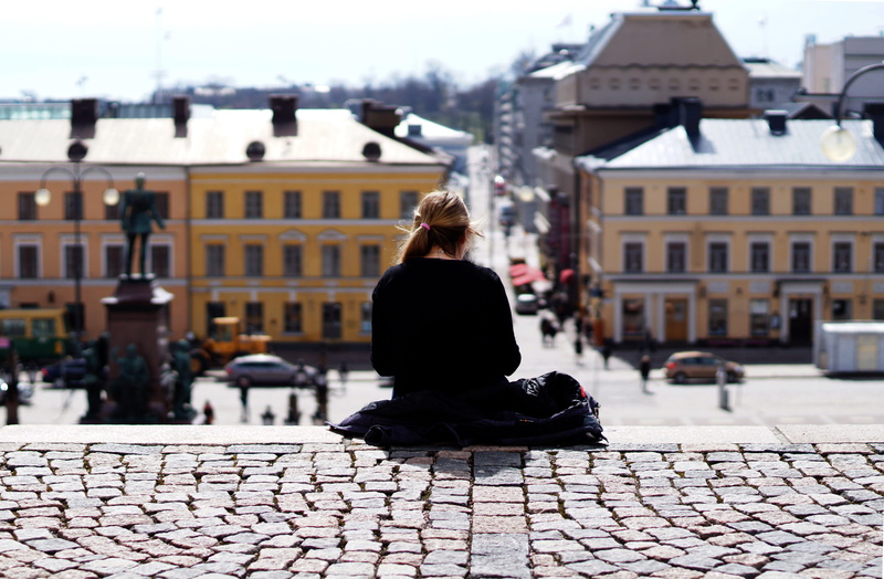 city, street, built structure, day, loner, casual clothing, sweater, focus on foreground, architecture, incidental people, paving stone, floor, rear view