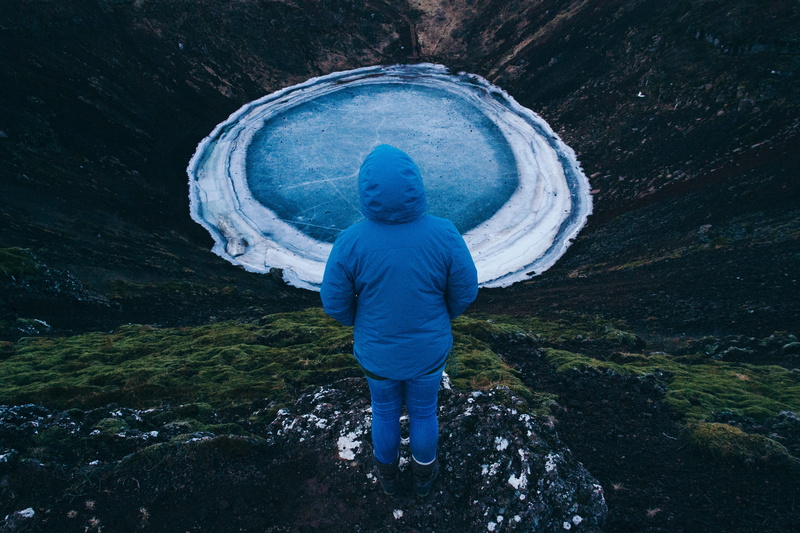 mossy, looking, standing, frozen, nature, clif, frozen lake, real people, blue, one person, scenics - nature, rock, full length, moody, rock - object, casual clothing