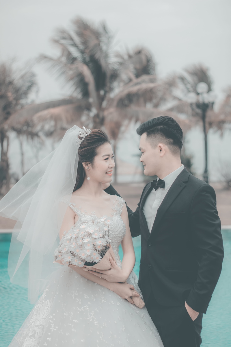 Bride and Groom, wear, positive emotion, bouquet, bridegroom, wedding ceremony, daytime, couple - relationship, smiling, women, photoshoot, groom, man