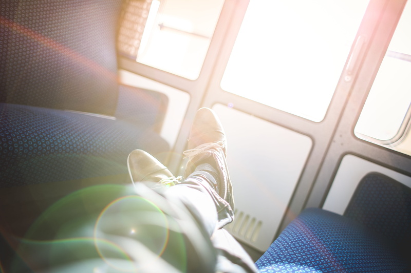 one Person, sitting, leather, human leg, human foot, shoes, leather shoes, man, indoors, seat, trip, day, mode of transportation, travel, passenger, boy