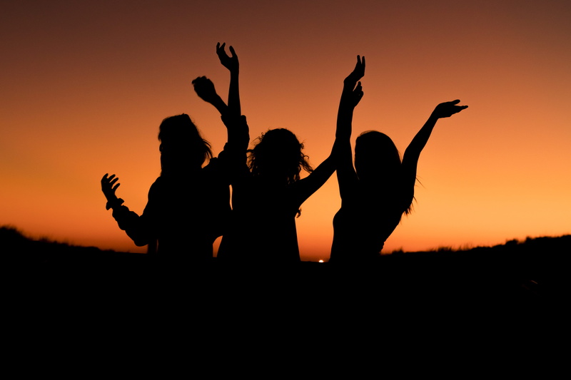 orange, dance, back lit, adult, people, arm, human body part, open air, positive emotion, freinds, silhouette, party, arms raised, three, outdoors, emotion