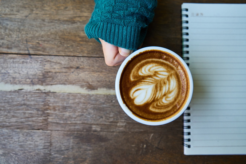 coffee, macro, photo, froth art, notebook, refreshment, break, cafe, holding, food, wood, caffeine, drinking, morning, frothy drink, cup, still life, human body part
