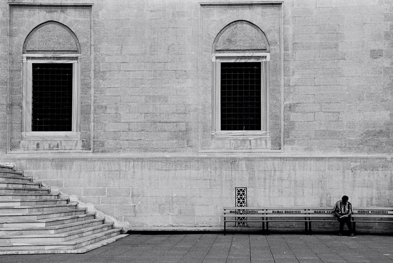 2K, women, building exterior, closed, outdoors, sad, stand alone, b add, single, photo, overview, black and white, building, beautiful, entrance, railing