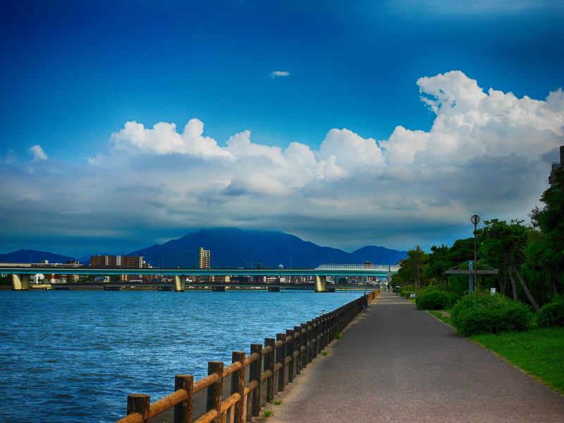 mountain, cloud - sky, transportation, summer, built structure, water, tranquility, travel destinations, bridge, outdoors, connection, promenade, atagohama