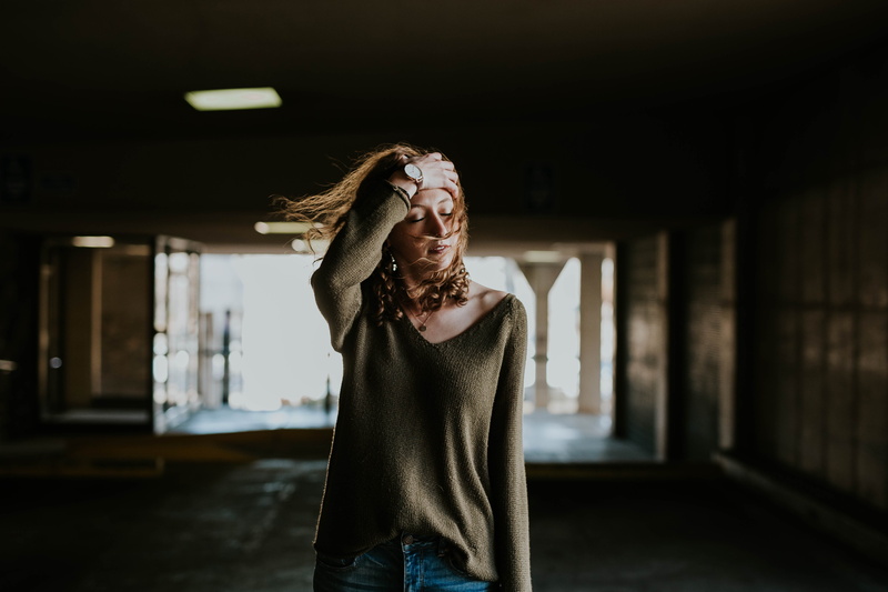 casual clothing, inside, people, beauty, focus on foreground, eyes closed, only women, clothing, sweater, brunette, standing, holding, women, adults only