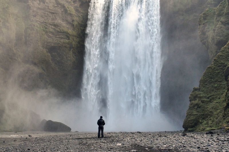 land, long exposure, water, lone person, beauty in nature, rear view, solo, scenics - nature, power in nature, looking at view, travel, rock, nature, one person