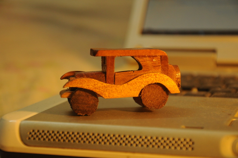 yellow, mode of transportation, transportation, machinery, indoors, 4K, metal, focus on foreground, symbol, no people, car, creative, table, day, rusty
