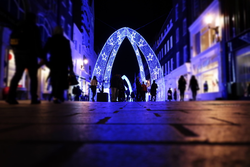 blue, adult, print, decor, crowd, arched, celebration, night, lifestyles, city, group of people, building exterior, lighting equipment, dark, surface level