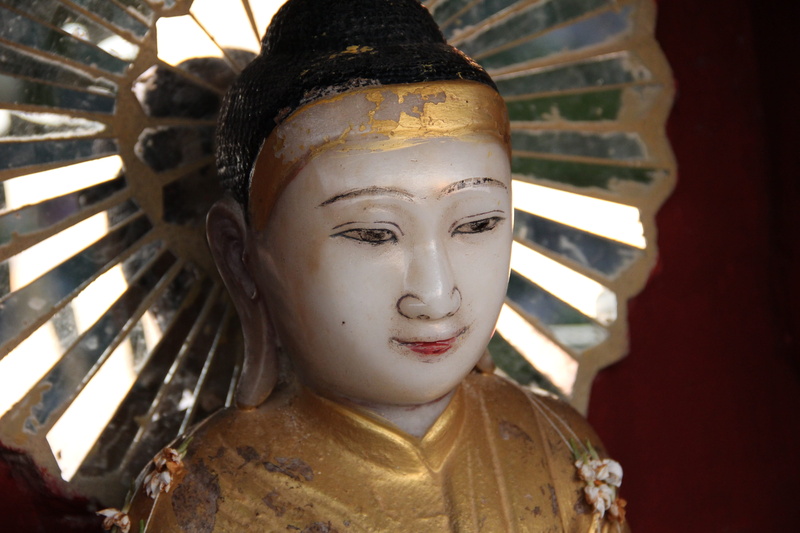 focus on foreground, belief, indoors, sculpture, headshot, asia, front view, gilded, craft, human representation, transcendence, gold, female likeness