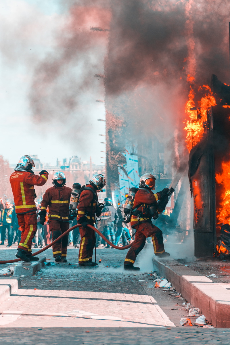 fire, occupation, men, people, government, headwear, outdoors, protection, firemen, real people, burning, smoke - physical structure, firefighter, group