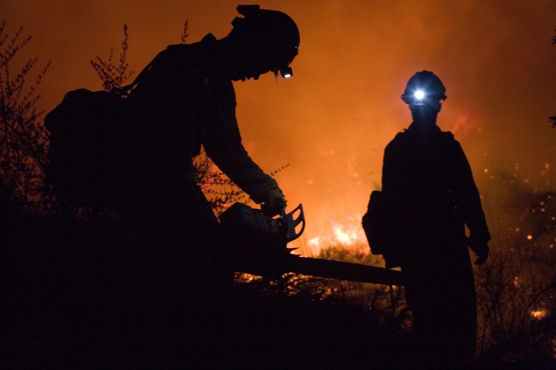 three quarter length, sky, standing, chain saw, two people, headlamps, nature, wildfire, communication, government, occupation, men, flames, weapon, forest fire