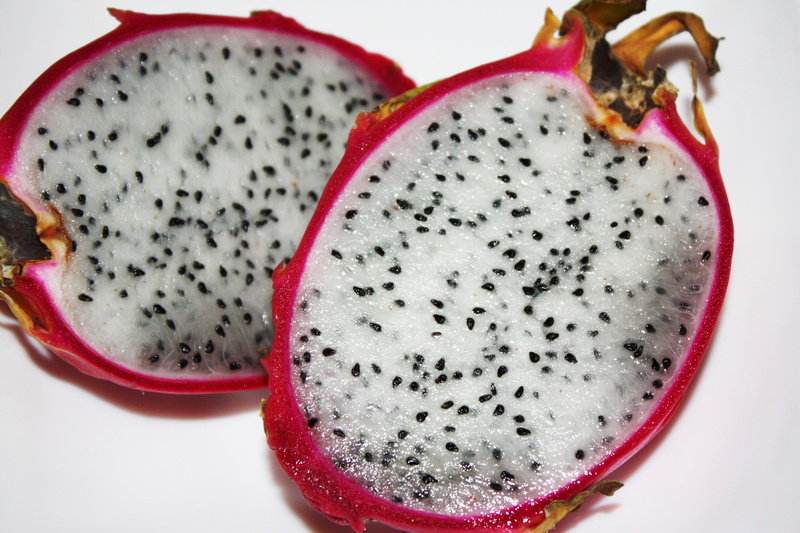 exotic fruit, red, cross section, white background, sliced, no people, pitahaya, tropical, seed, fruit, halved, surface, directly above, fresh, close-up