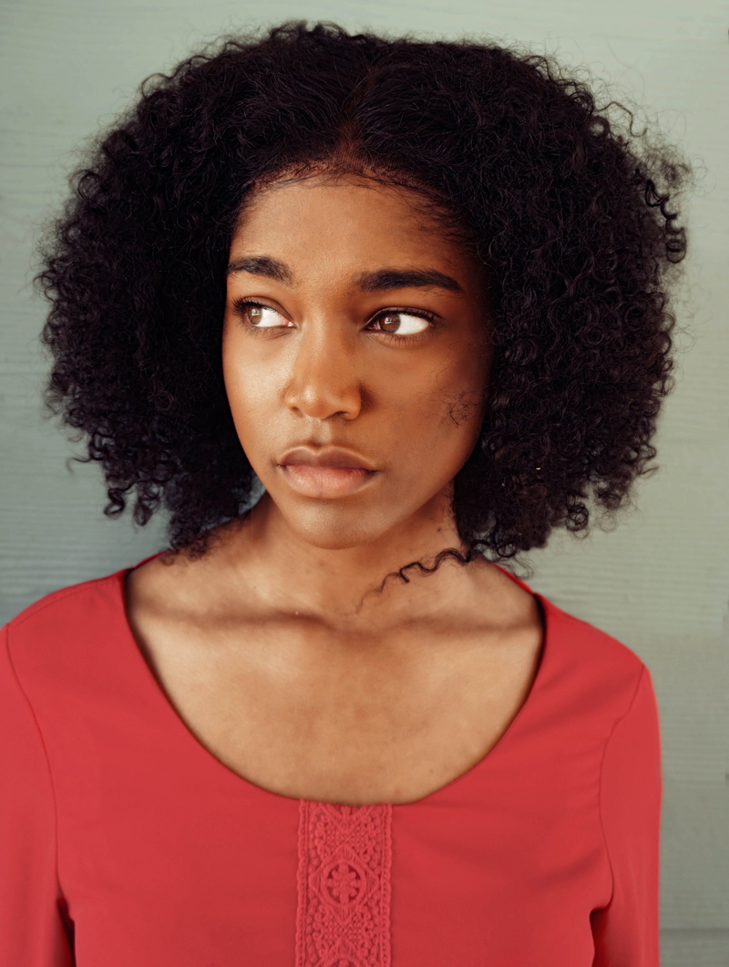 casual clothing, one person, front view, african american, close-up, pose, women, lady, person, curly hair, curly, black hair, black, attire, studio shot