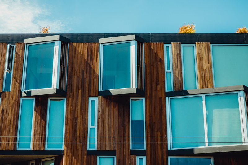 flooring, clear sky, curtain, handrail, turquoise colored, low angle view, banister, text, nature, shelf, architecture, wood, building exterior, blue, side by side
