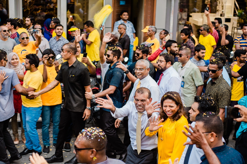 yellow, adult, festival, large group of people, standing, celebration, protest, politics, islam, real people, muslim, togetherness, group, candidate, action