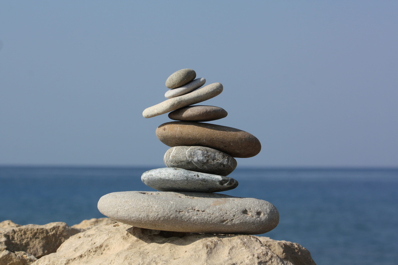 rock - object, blue, force, thinking, pillar, stone tower, solid, spirit, nirvana, reflection, land, nature, outdoors, beach, pebble, relaxation, harmony