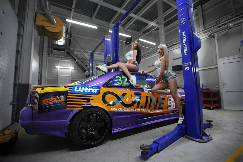 blonde, jean shorts, sitting, women, 2K, women with cars, Garage, sneakers, brunette, two women