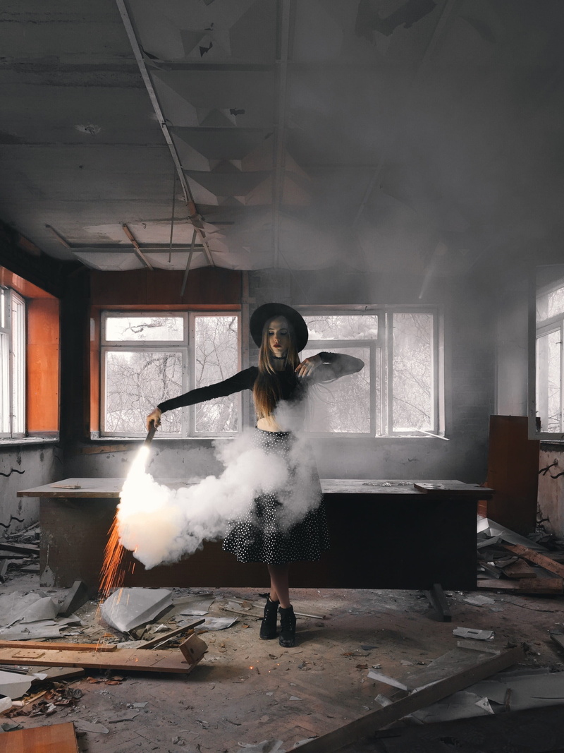casual clothing, messy, hairstyle, women, woman, house, flare, smoke, full length, inside, young adult, standing, lifestyles, indoors, photoshoot, wear