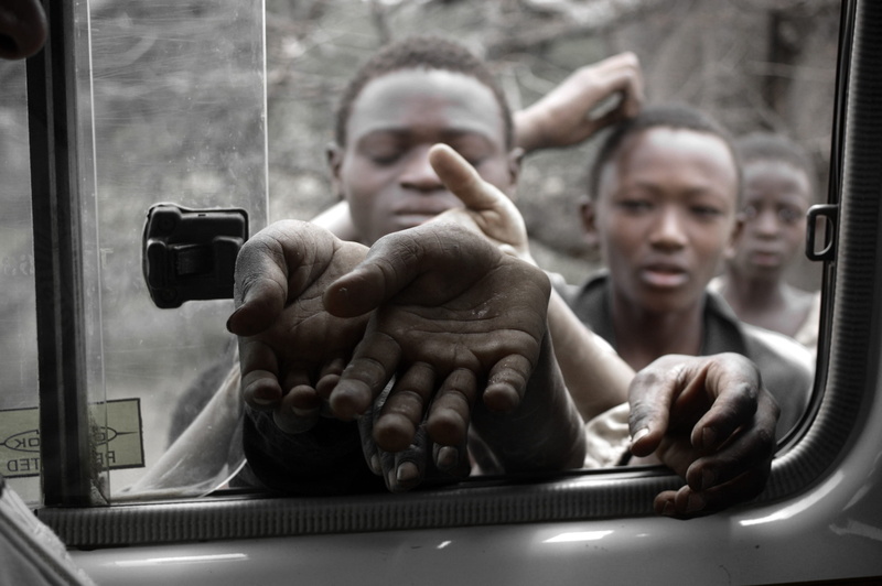 starving, outdoors, male likeness, human representation, mature adult, close-up, males, portrait, statue, starving children waiting, young adult, looking through window