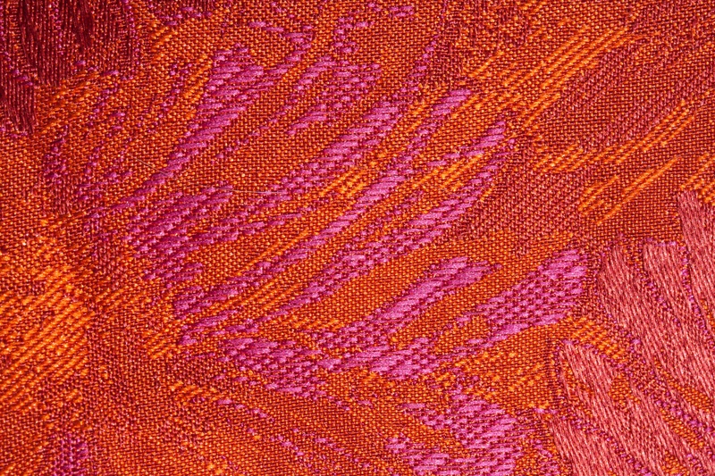 jacquardmusterung, orange, indoors, red, man made, woven, textile, creativity, full frame, flowers, fund, fabric, pink, material, carpet - decor, still life