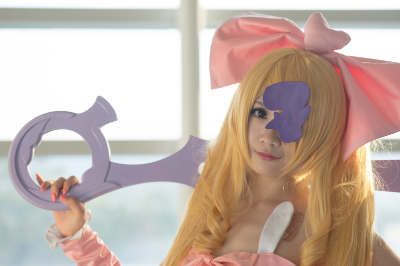 holding, fashion, Harime Nui, 5K, front view, real people, hairstyle, beautiful woman, hair, headshot, cosplay, one person, indoors, leisure activity