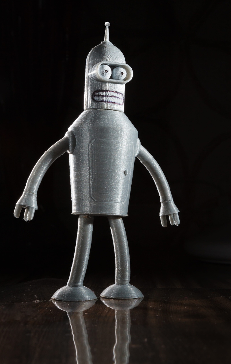 wood - material, indoors, studio shot, toy, black background, 3d print, bender, art and craft, silver colored, human representation, robot, futurama, creativity