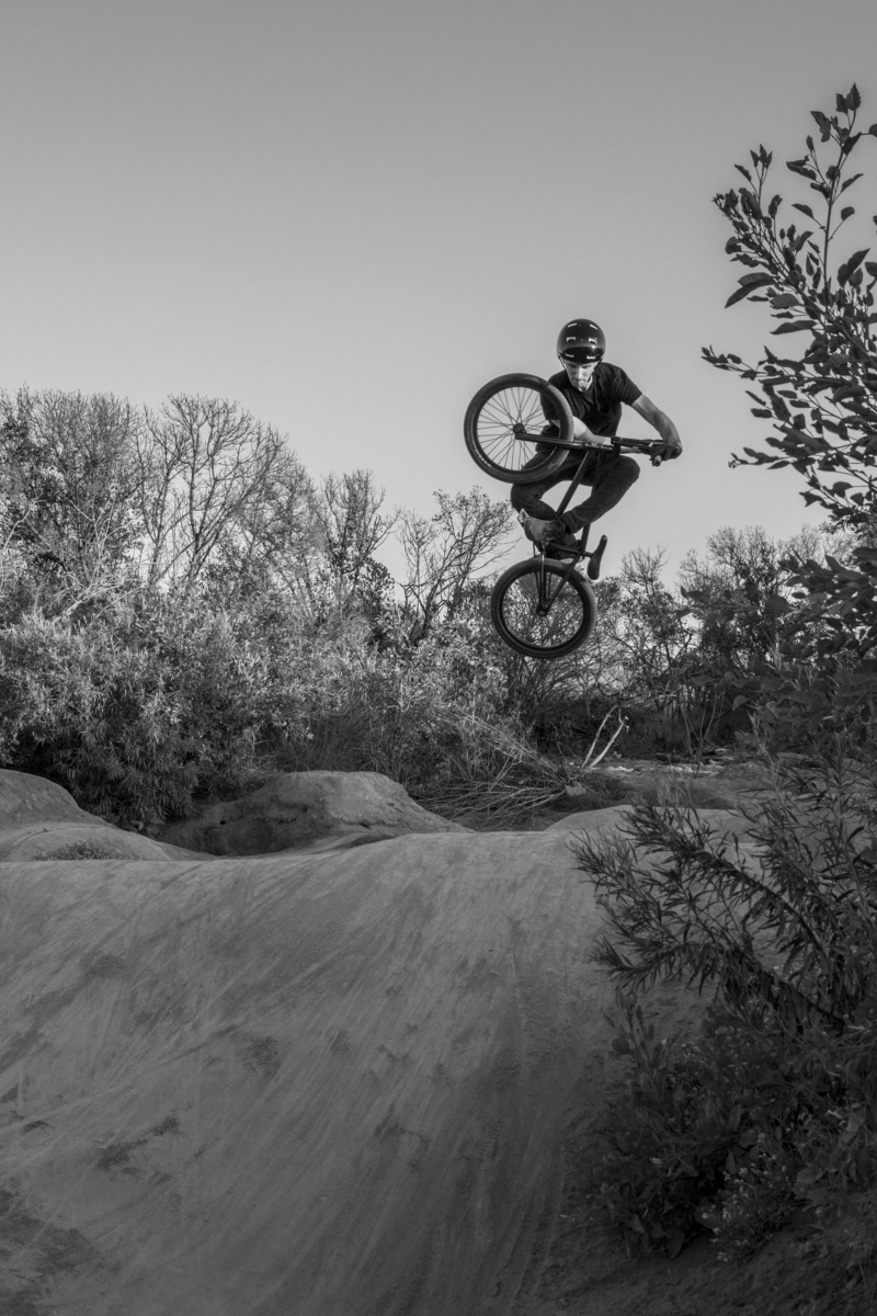 dirt jumps, bmx, plant, helmet, extreme sports, 4K, full length, black and white, skill, one person, sheep hills, united states, ride, crash helmet, outdoors