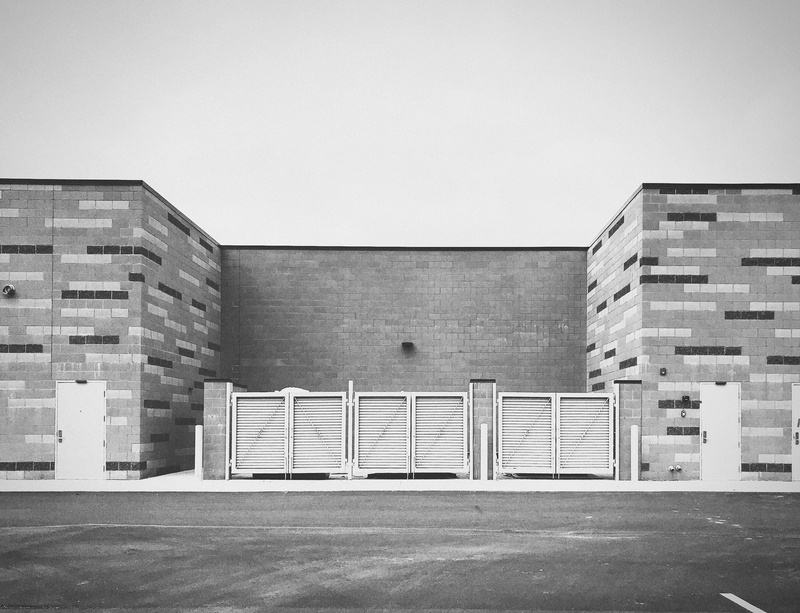 street, no people, wall - building feature, sky, outdoors, back, gate, vast, space, day, alley, wall, landscape, negative, united states, building exterior