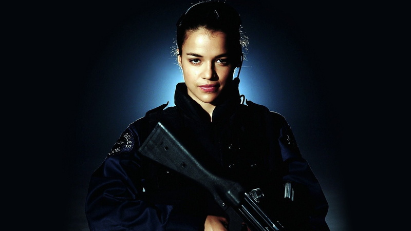 one person, holding, S.W.A.T., adult, musician, looking at camera, young women, Movie, Michelle Rodriguez, waist up, beautiful woman, hairstyle, women