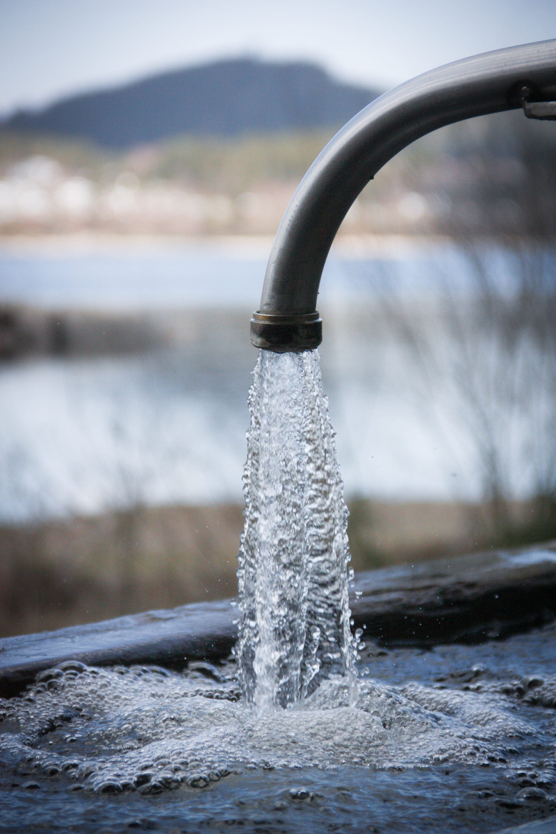 river, shower faucet, focus on foreground, spiral, rain barrel, nature, dropping, tap, indoors, coil, waterfront, no people, shower, spigot, sink, drop