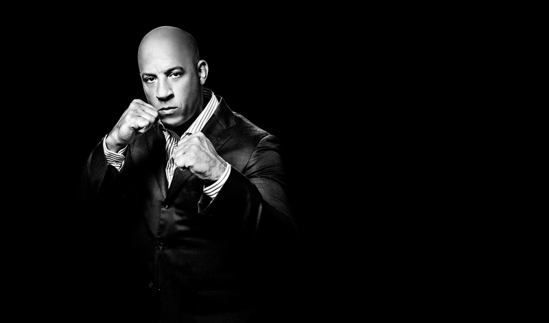 filmmaker, pose, VIN Diesel, background black, actor, 2K, film producer, writer, stand, costume