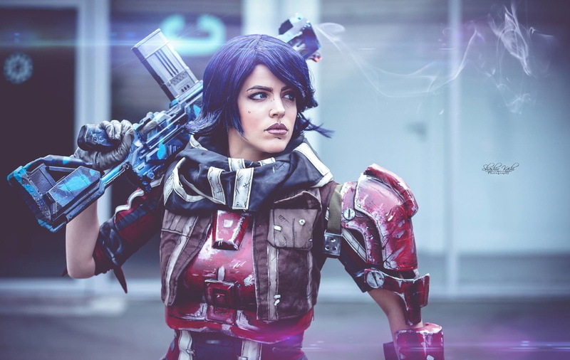 focus on foreground, beautiful woman, holding, one person, young adult, Athena (Borderlands), beauty, clothing, adult, Cosplay, Women, illuminated, portrait