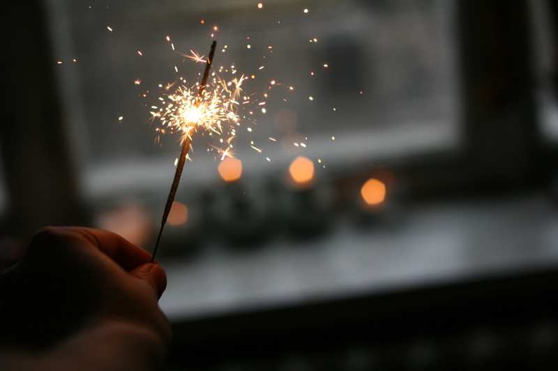 light, motion, firework - man made object, body part, night, hand, people, glowing, person, celebration, sparkler, outdoors, bright, sparklers, one person