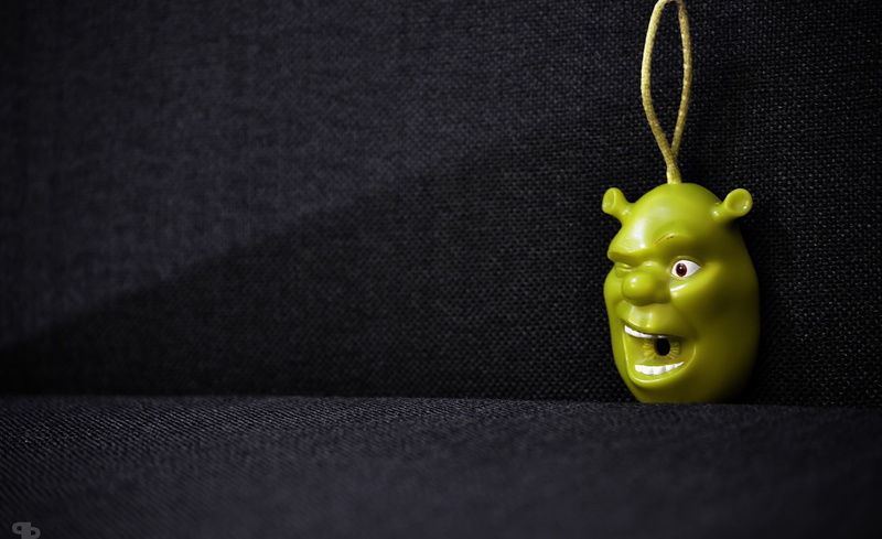 sherk, art and craft, human representation, Shrek, no people, yellow, studio shot, single object, table, key, black background, green color, toy, pepper