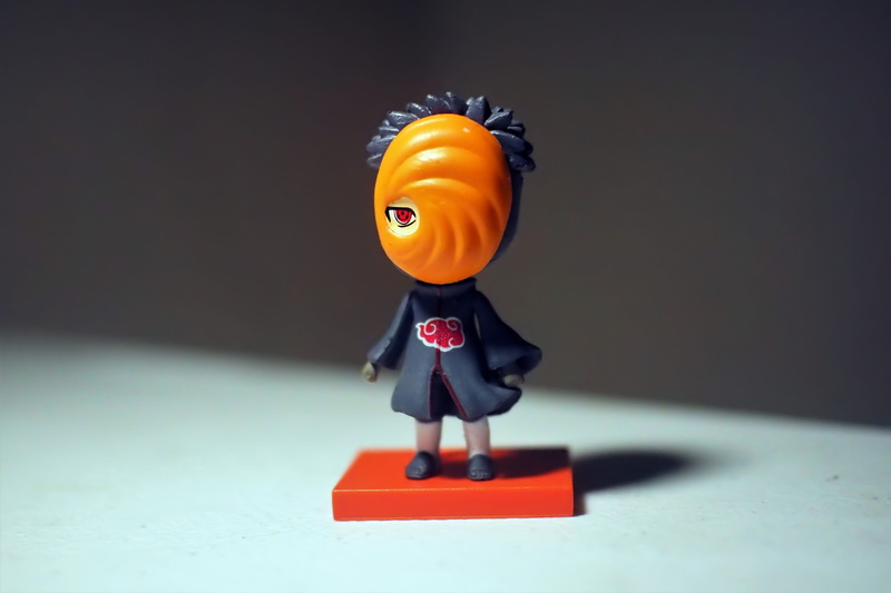 cartoon, studio shot, tv, japanese, orange color, cute, figurine, television, 4K, toy, anime, male likeness, character, single object, art and craft, plastic