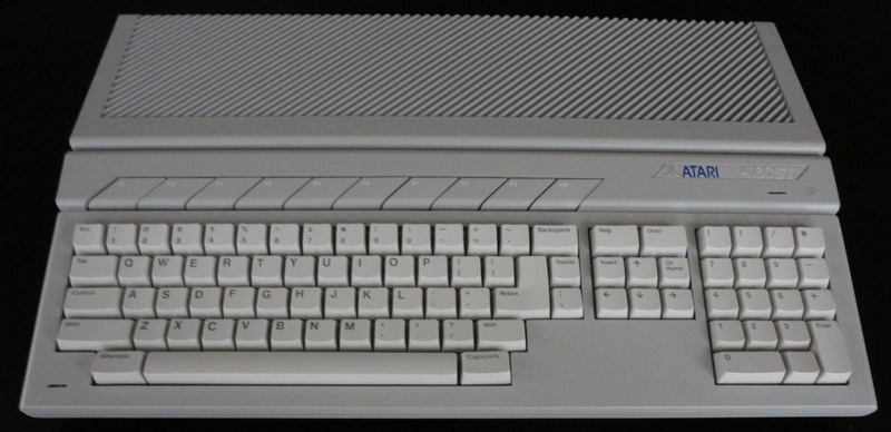 close-up, letter, high angle view, black background, connection, computer equipment, wireless technology, communication, technology, laptop, finance, atari 1040st