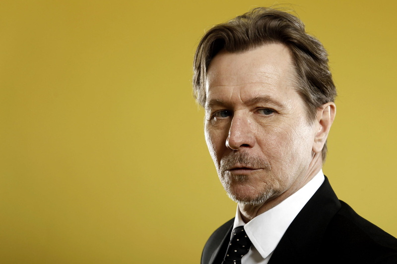 formalwear, look, looking at camera, one person, portrait, indoors, Gary Oldman, black, beige background, actor, men, yellow, s, studio shot, colored background