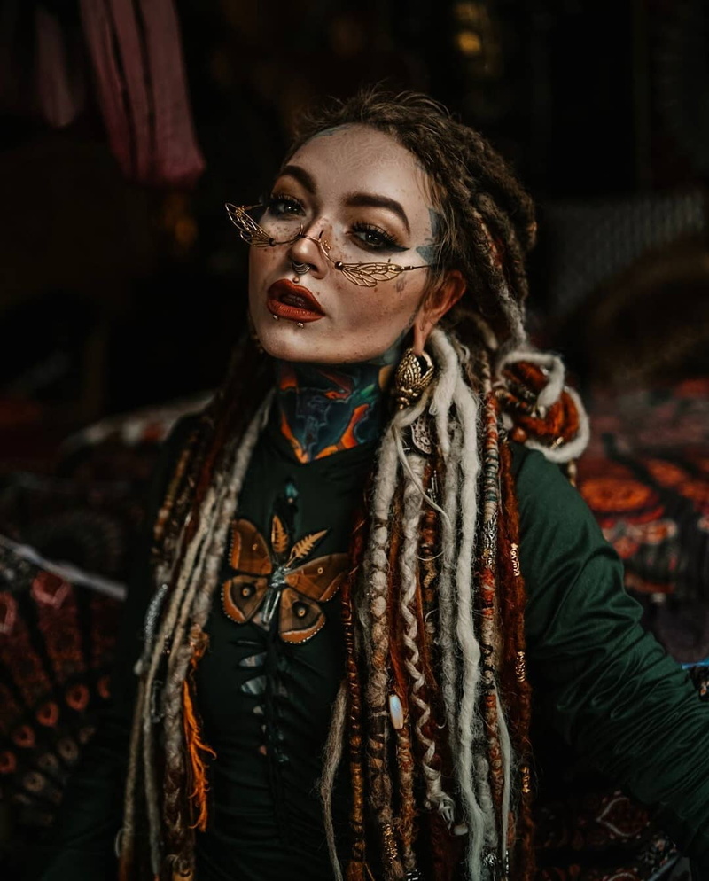 720P, vertical, women indoors, lipstick, eyelashes, Stretched ears, bokeh, glasses, young woman, dark background, Pierced Lips, tattoo, natural light