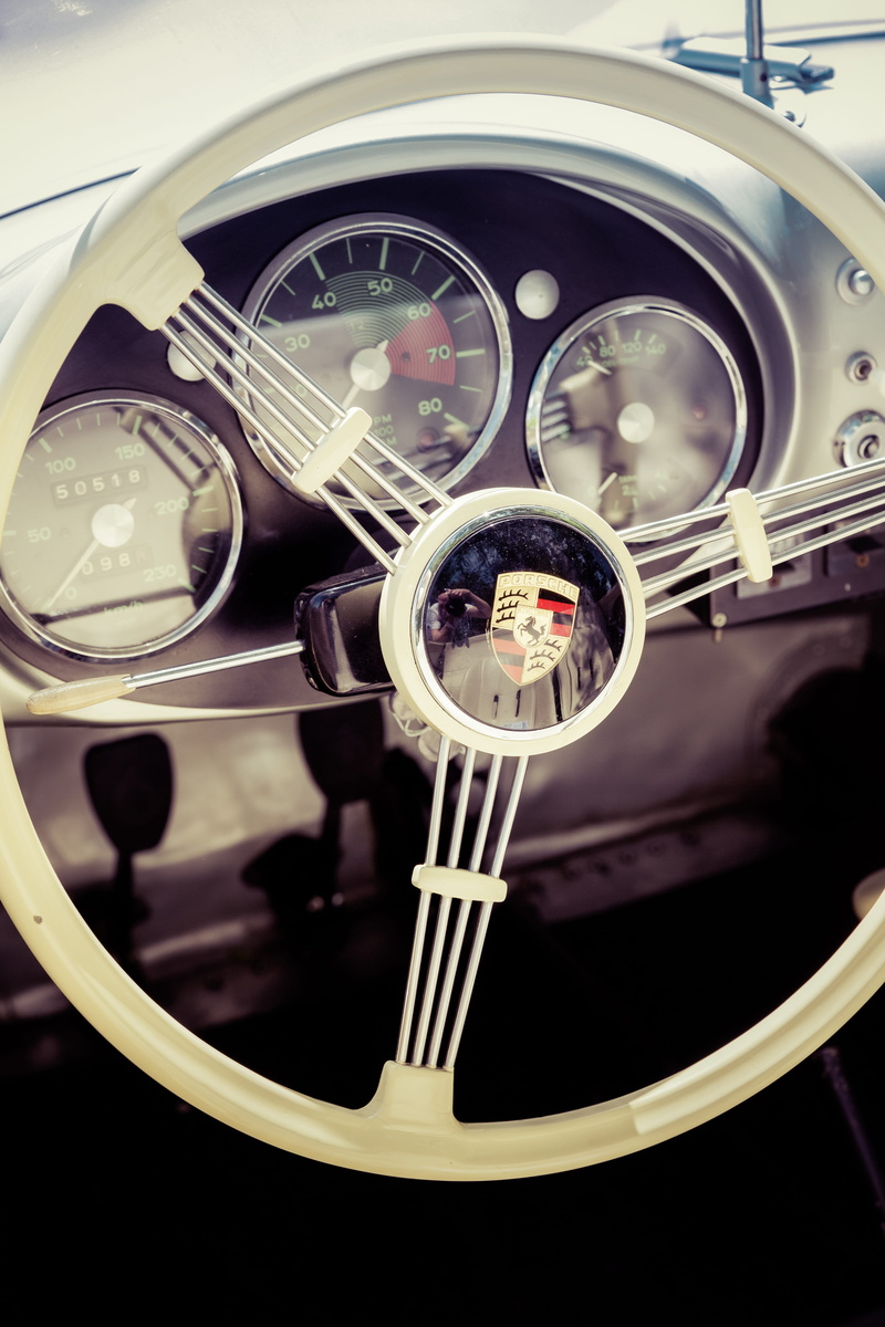 car, land vehicle, gearshift, tire, no people, vehicle interior, speedometer, close-up, wheel, motor vehicle, technology, vehicle, england, white, focus on foreground