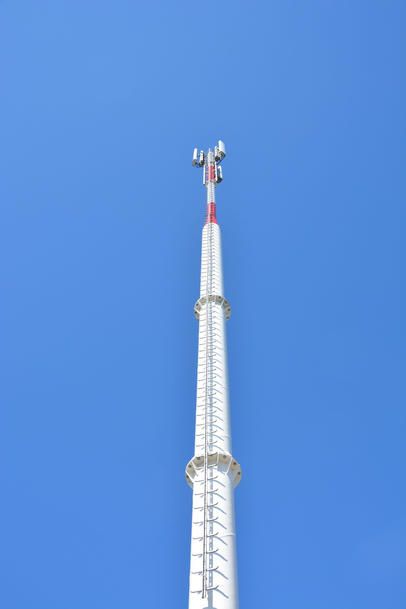 mast, silver colored, sunny, clear sky, communication, broadcasting, blue, cell tower, no people, low angle view, architecture, 4g, the cellular network
