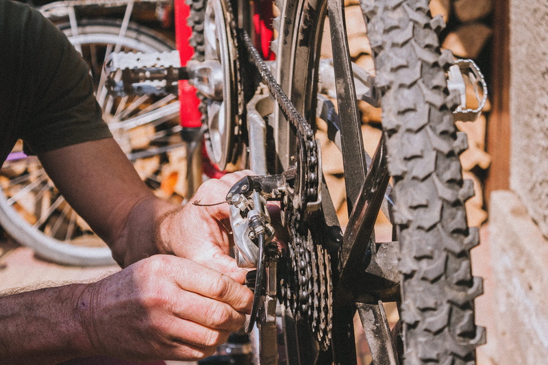 mechanic, repairing, technician, spanner, tool, occupation, hand, bicycle, human hand, one person, wheel, work tool, men, working, 2K, mode of transportation