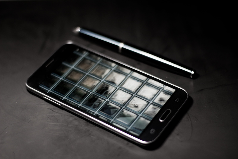 musical instrument, indoors, wireless technology, high angle view, studio shot, no people, technology, phone, communication, selective focus, convenience